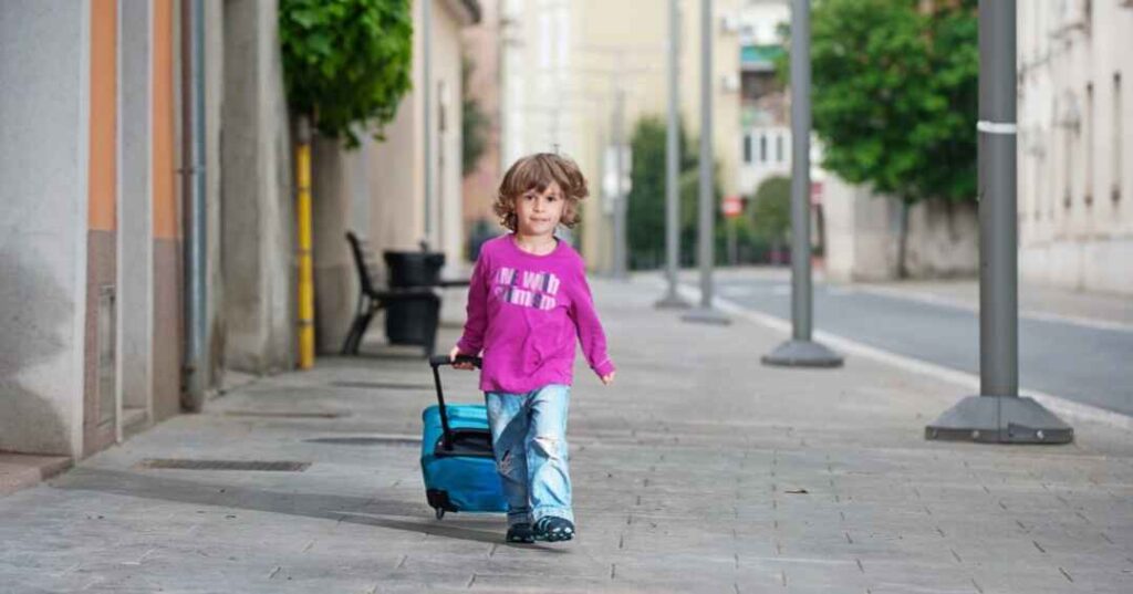passports and visas for kids and adults, child with luggage