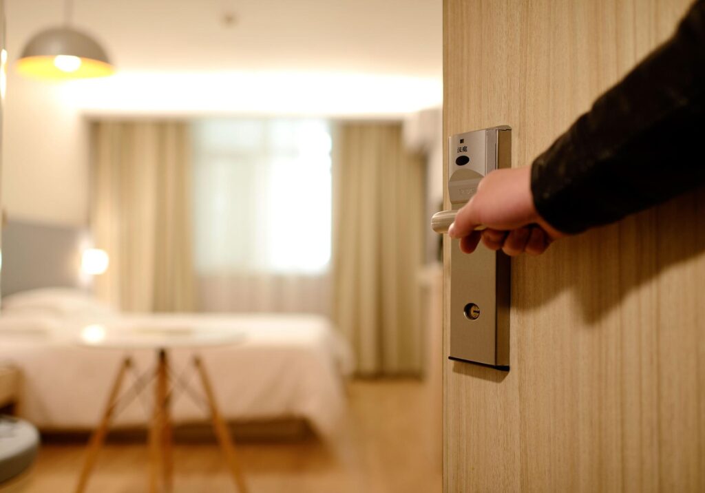 hotel door opening to room