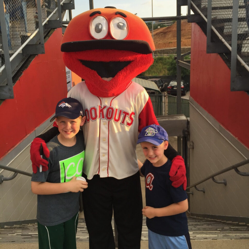 Chattanooga weekend getaway with family, Lookouts mascot with two boys