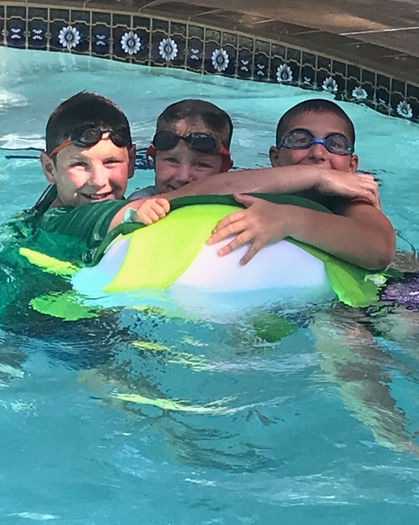 kids in pool with beach ball, things to do in Mount Dora